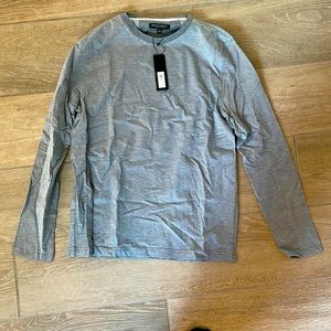 New, never worn Banana Republic Luxury Touch long sleeve shirt. Men’s medium.